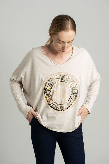 Beżowa bluzka oversize z błyszczącym nadrukiem