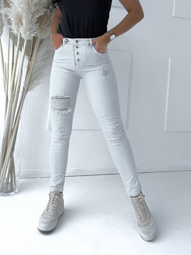 Jasnobeżowe jeansy z podszytymi przetarciami By o la la