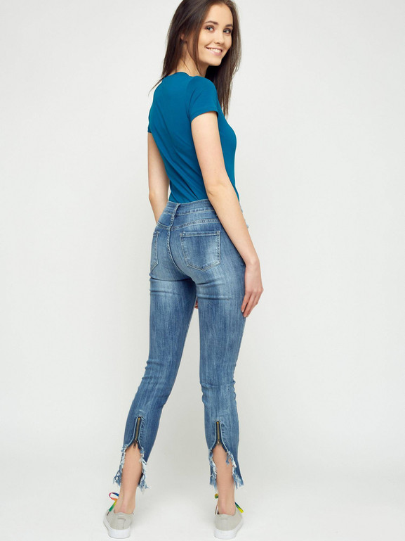 Jeansy z rozdarciami i ozdobnym zamkiem niebieskie