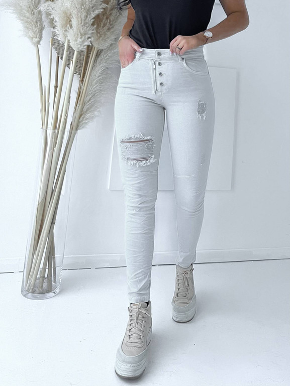 Jasnobeżowe jeansy z podszytymi przetarciami By o la la