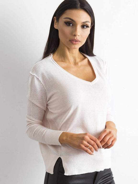 Jasnoróżowy sweter z dekoltem w serek