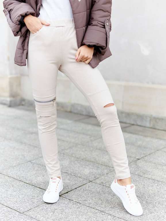 Beżowe spodnie materiałowe przecięcia By o la la