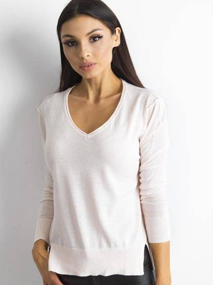 Jasnoróżowy sweter z dekoltem w serek